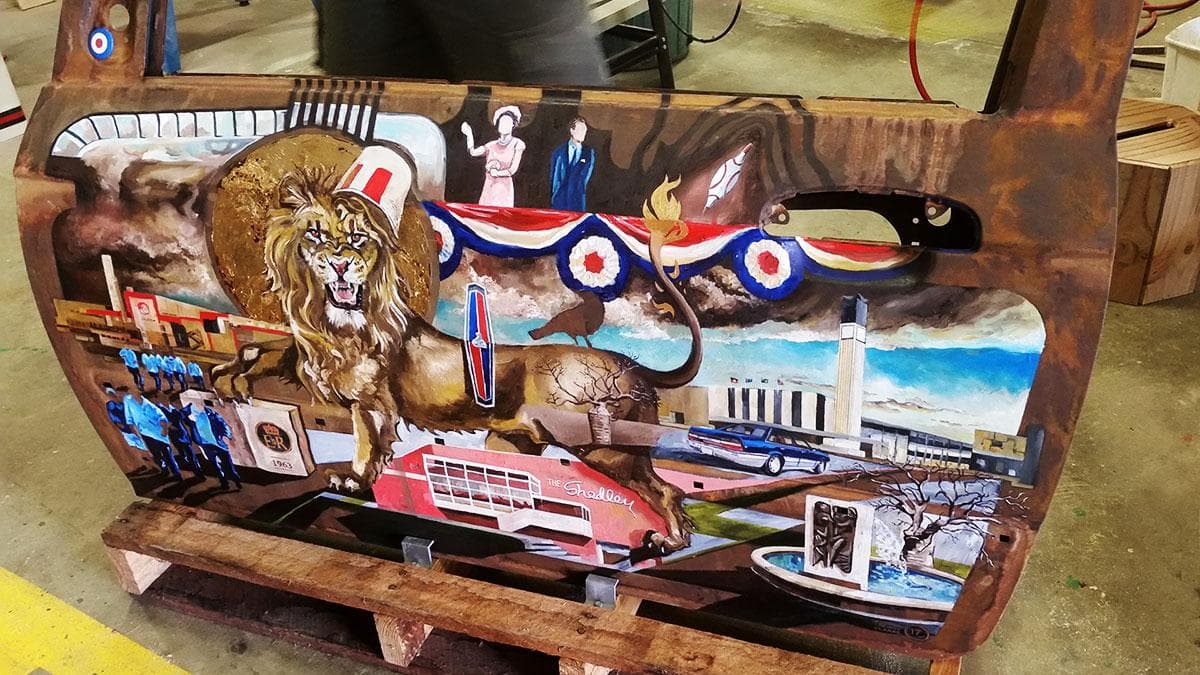 Wooden car door panel with scenes from Playford history painted on the side