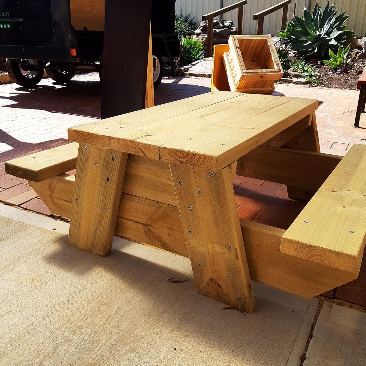 Wooden picnic table and benches